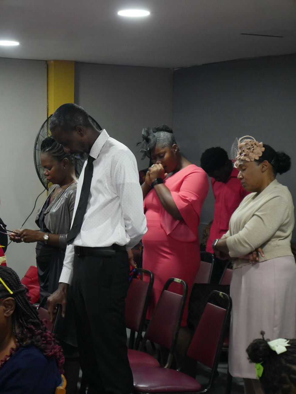 Congregation worship moment at Portmore New Testament Church of God